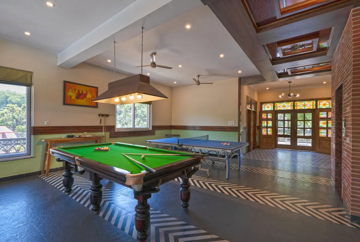 An amazing game room with pool table and table tennis