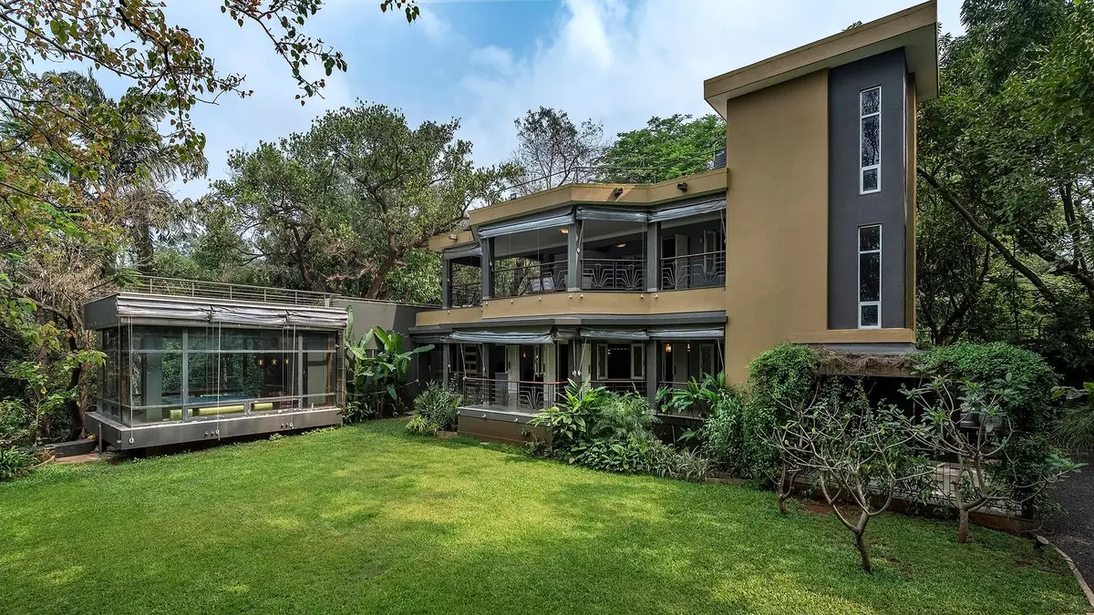The sprawling lawn, canopied deck and spacious interiors make this home ideal for small celebrations and gatherings.