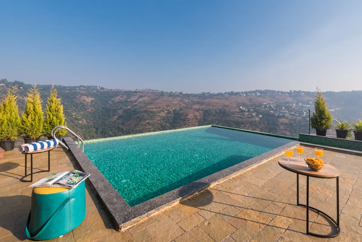 Take a plunge into the infinity pool with a stunning valley vista