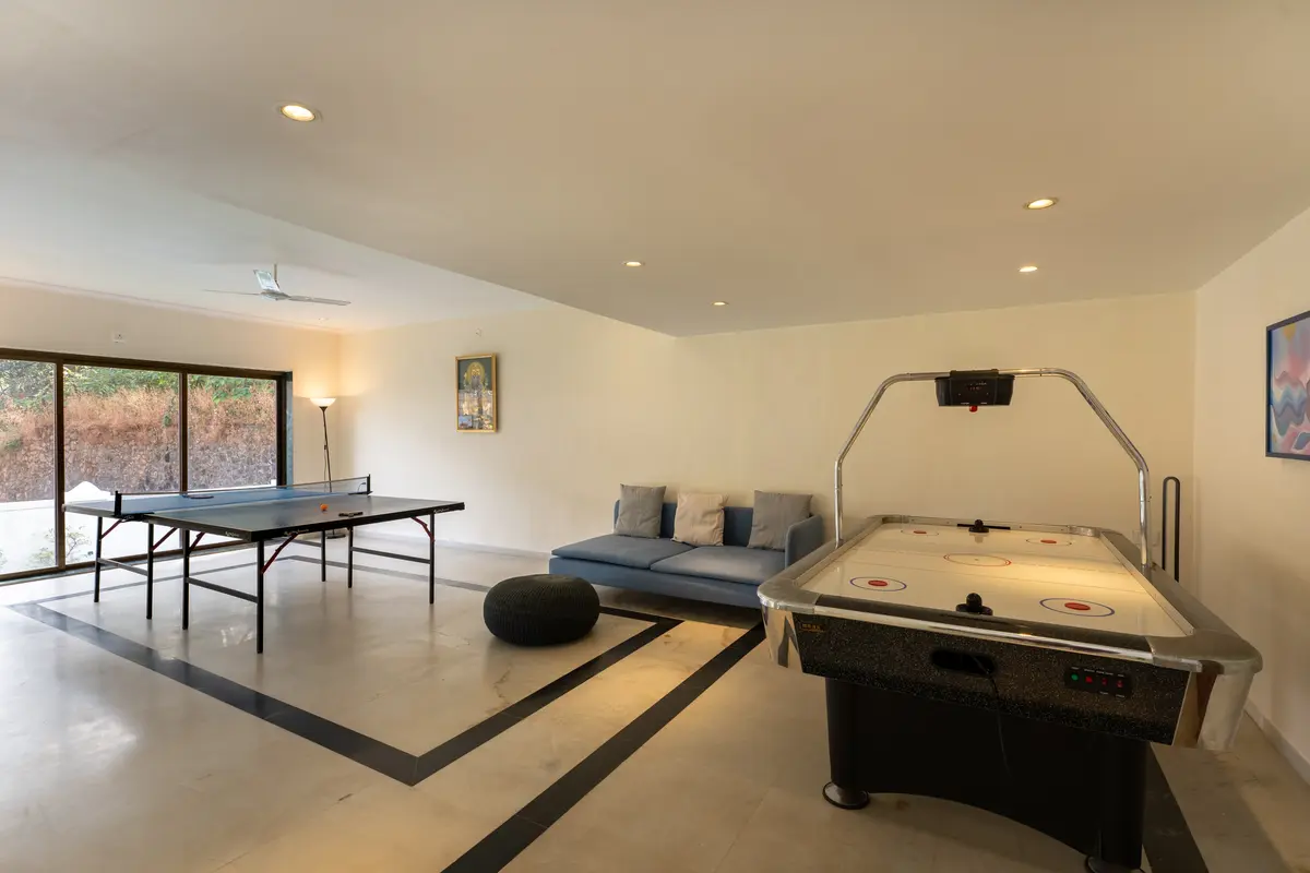 Indulge in a game of table tennis or air hockey in the entertainment room