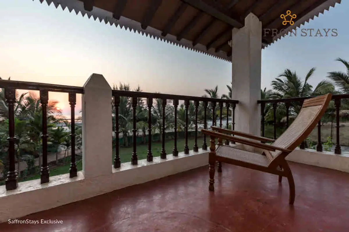 Watch the waves crash against the rocks from the comfy, vantage point of the verandah.