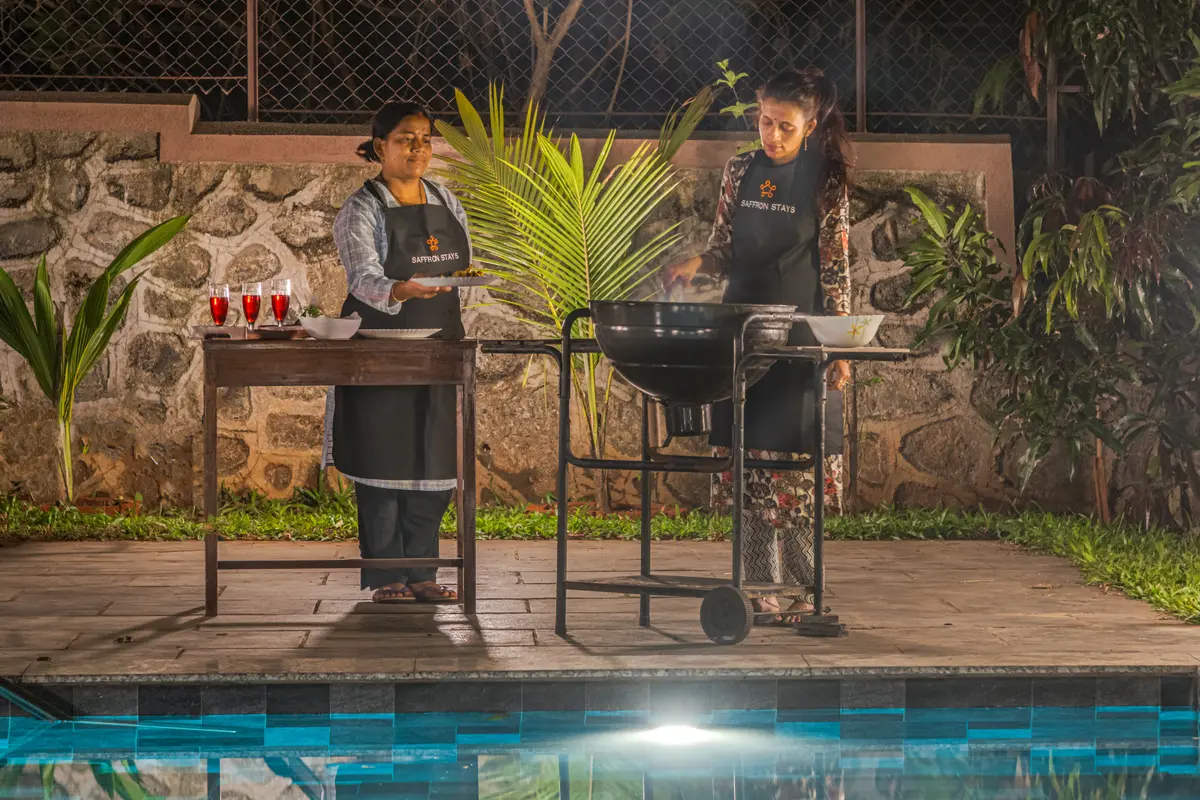 Barbeque setup by the pool for perfect outdoor gatherings