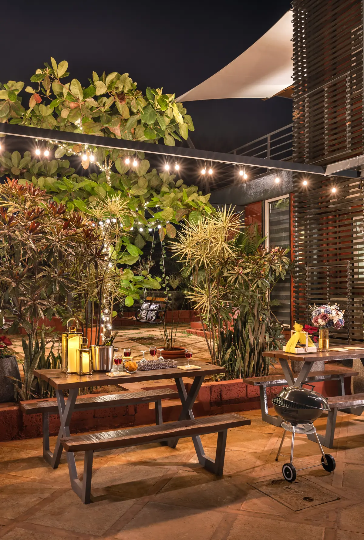 Lush lawn with outdoor seating and delightful swings