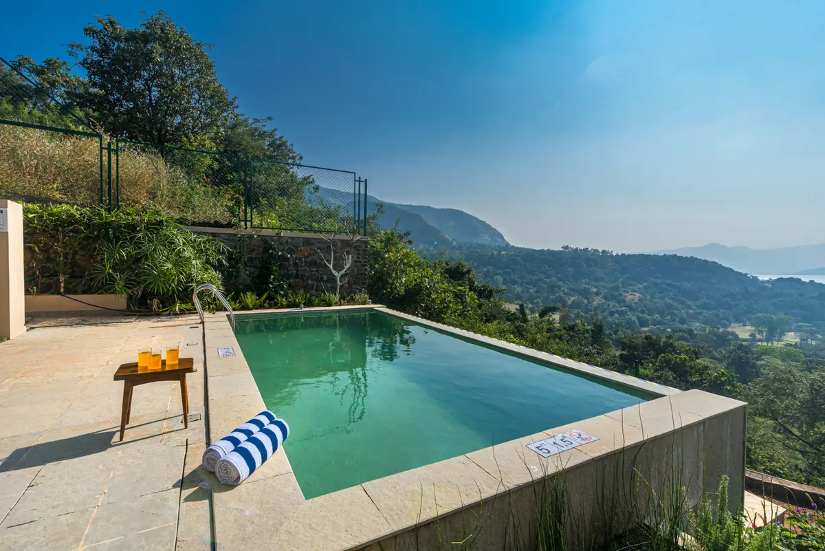 Enjoy a leisurely afternoon by the poolside with your favourite drink.