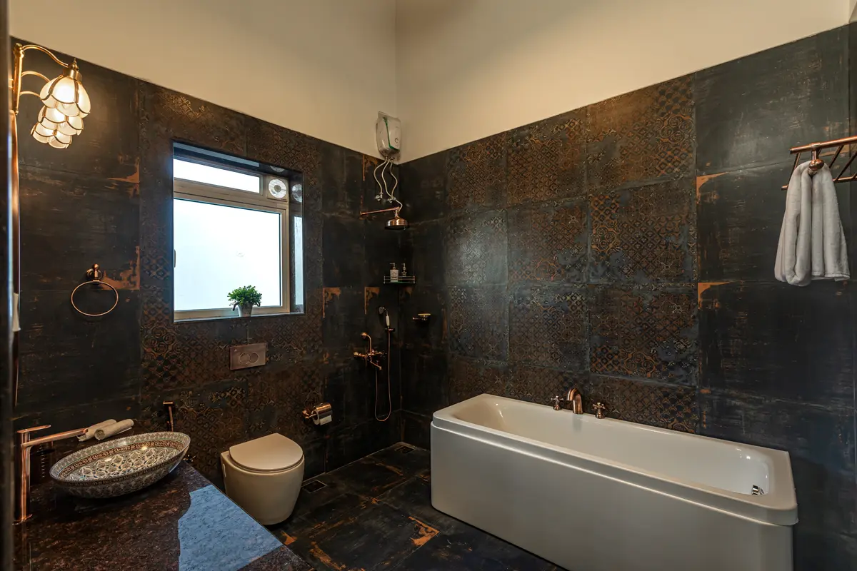 Indulge in a relaxing soak in the stunning bathtub.