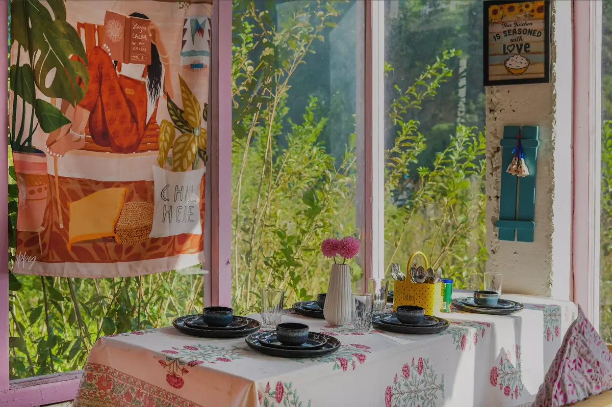 Serene dining area with a view of the mountains, ideal for enjoying delicious meals