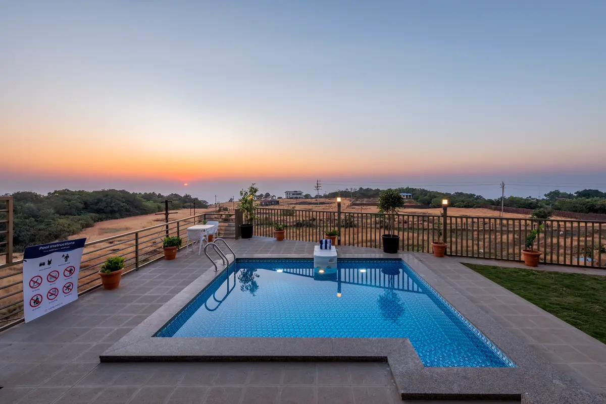 Dip into the crystal clear waters of the pool, surrounded by breathtaking mountain views