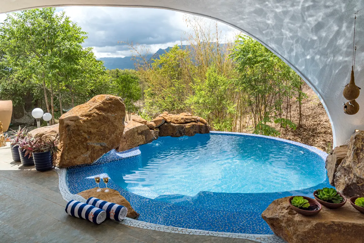 Lounge in the pool with infinite views of the forest