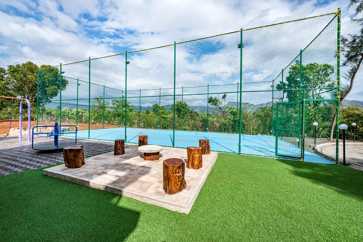 The outdoor basketball court and kids play area makes it perfect for a family getaway