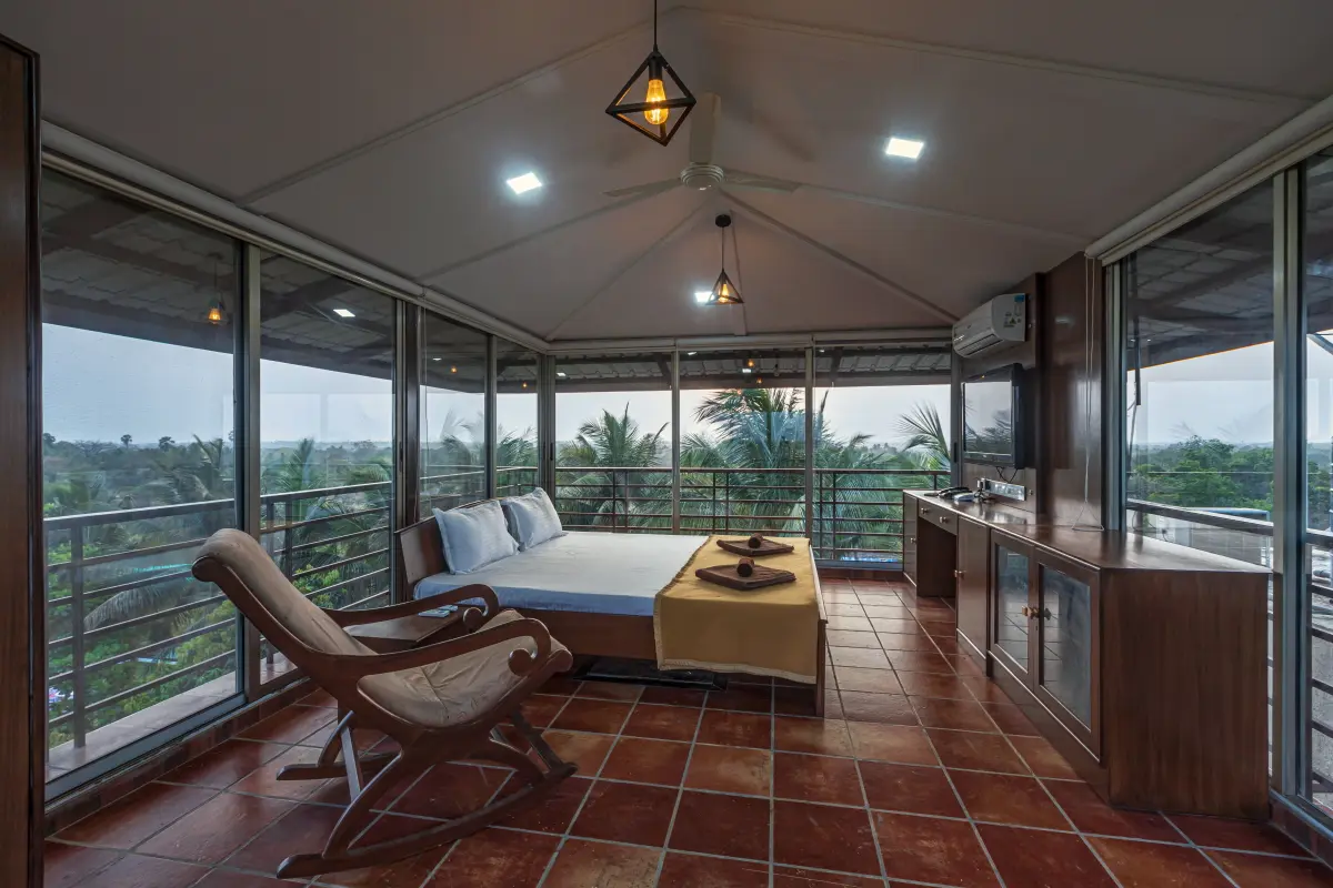 Experience what living in an actual glass room feels like and enjoy 270-degree views of Nagaon - mountains, farms, greenery and open skies!