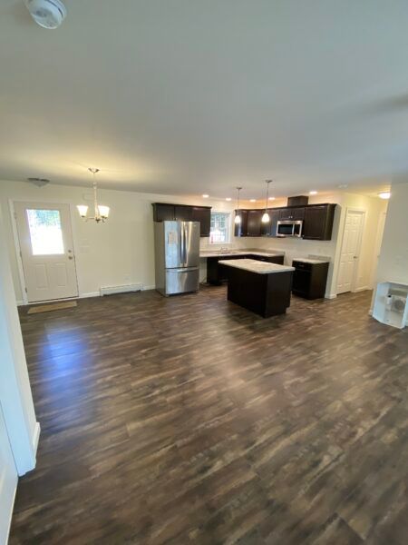 open concept in new custom modular ranch home project completed by Brookewood Builders, Manchester, ME 04351