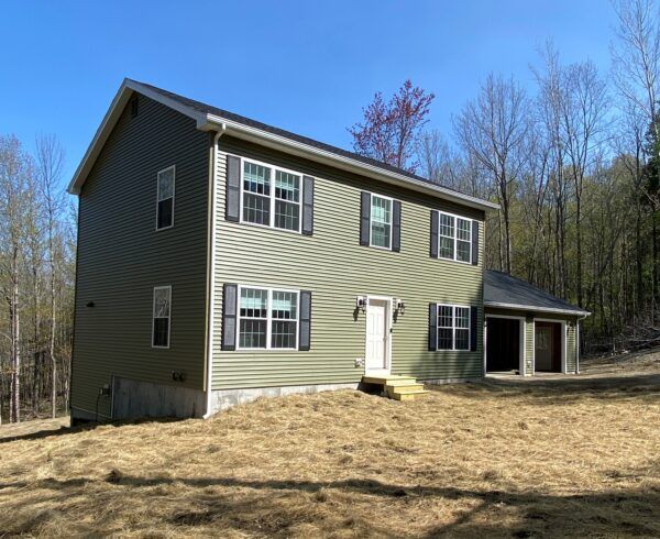 new custom modular two story home project with attached garage completed by Brookewood Builders, Manchester, ME 04351