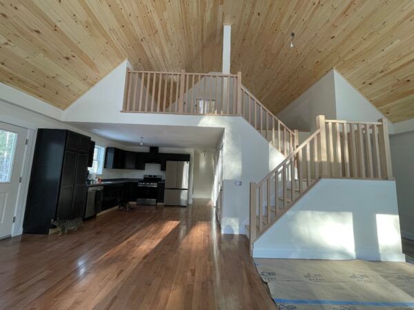 vaulted ceiling with loft in new custom modular cape chalet home project completed by Brookewood Builders, Manchester, ME 04351