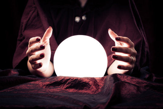 crystal ball with hands