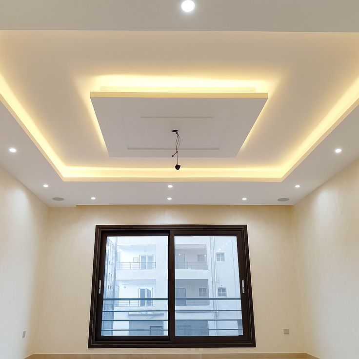 Modern geometric gypsum tray ceiling with integrated lighting in a Nairobi apartment
