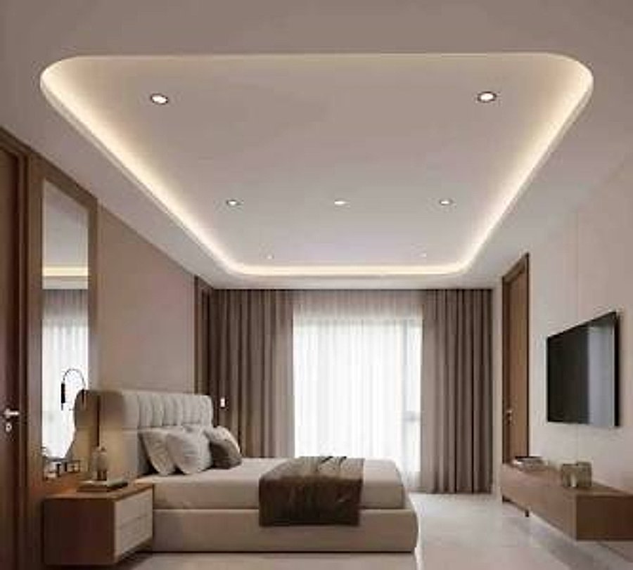Simple rectangular tray gypsum ceiling with cove lighting framing a small living room