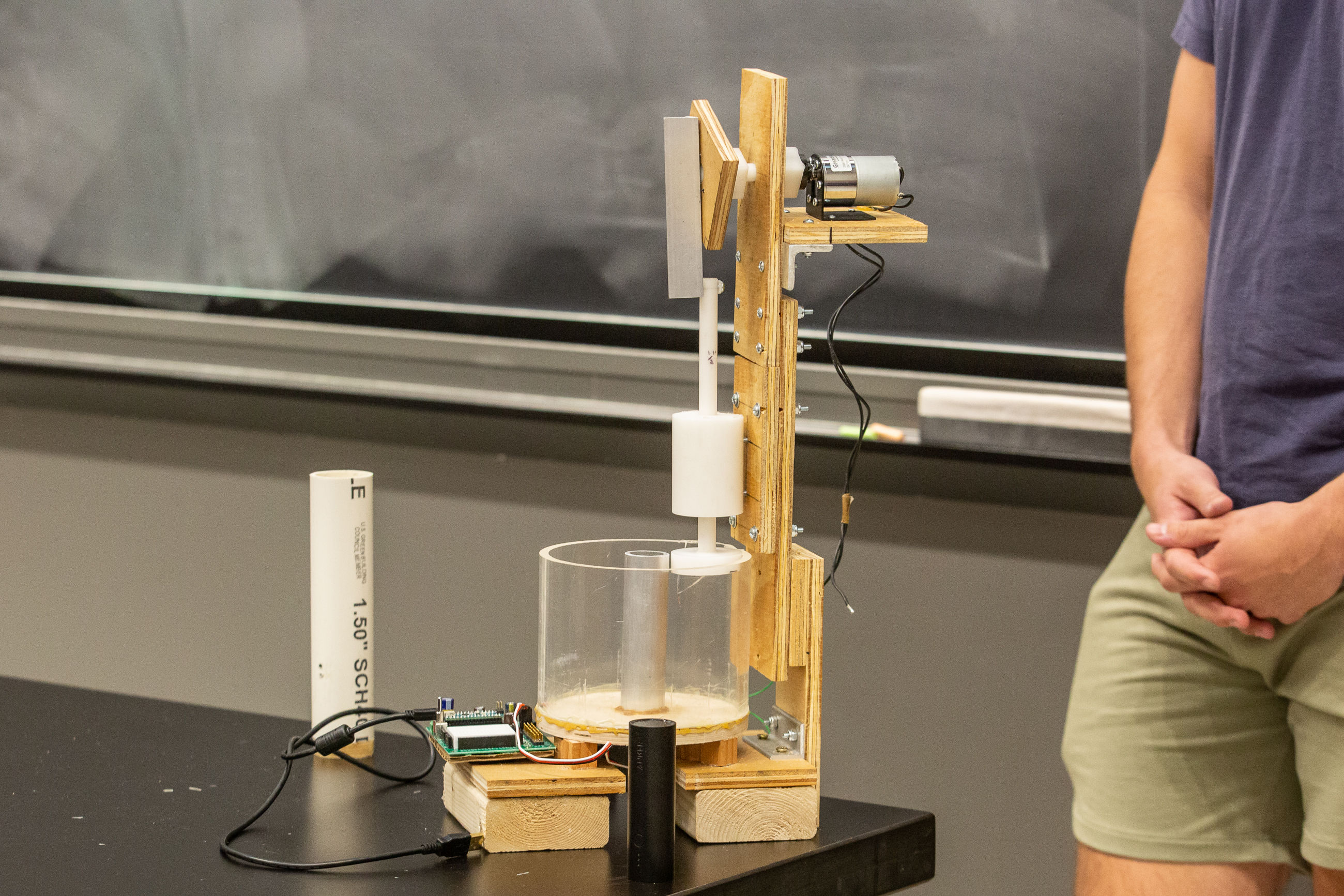 A machine that can automate the squishing of avocados in a household setting.