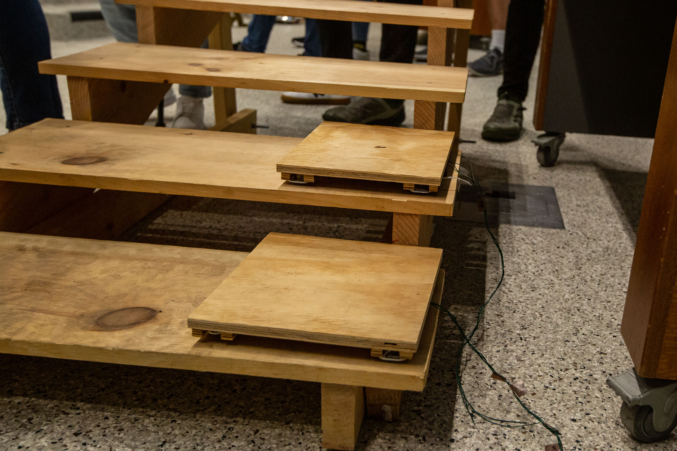 A device installed with stairs that will detect when a user is falling and deploy protective mechanisms.