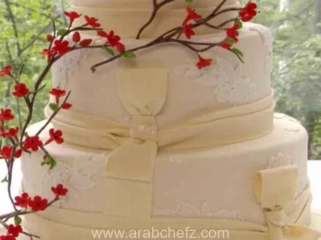 طريقة تحضير كعكة الزفاف بالقرفة والفانيلا كعكة زفاف بالقرفة والفانيلا مع كريمة الشوكولاتة المكسيكية
