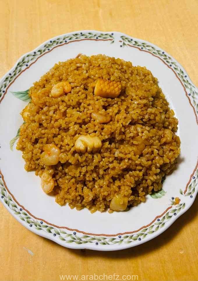 أرز مقلي بالمأكولات البحرية