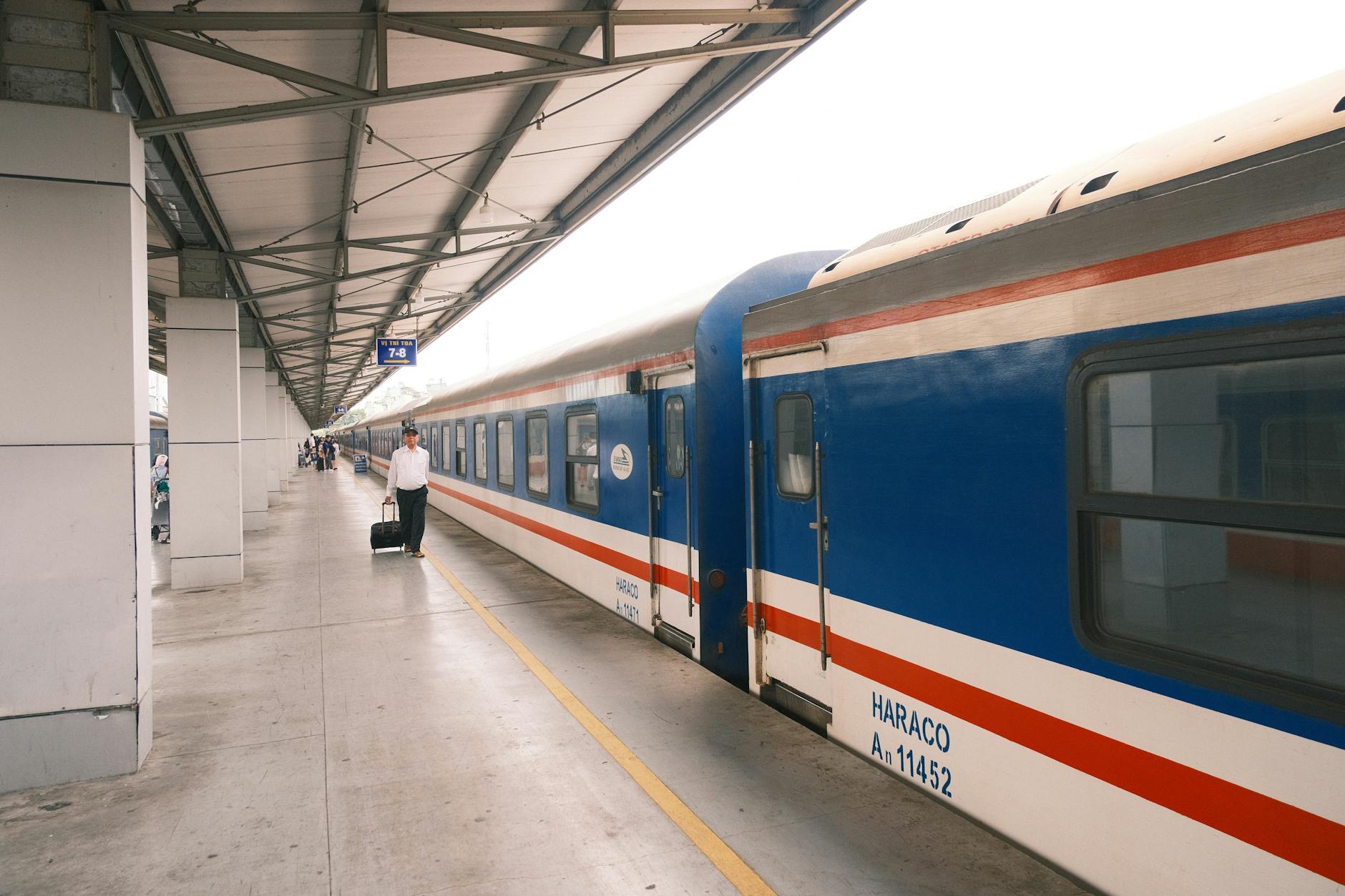 Overpacked luggage and missed train schedules on lavish station platform at dawn