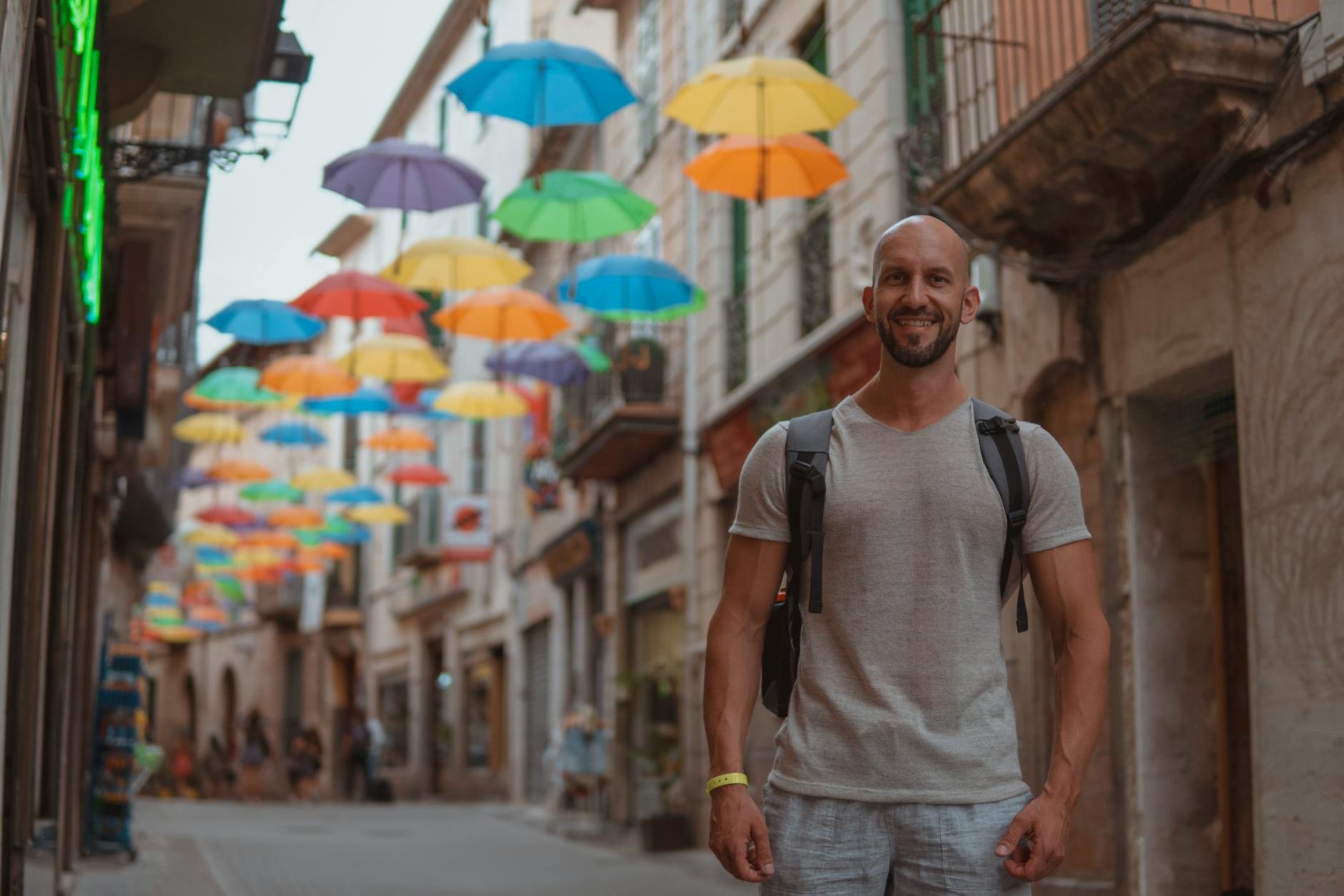 Traveler relaxing at a local café near a stadium soaking in community life before a major match