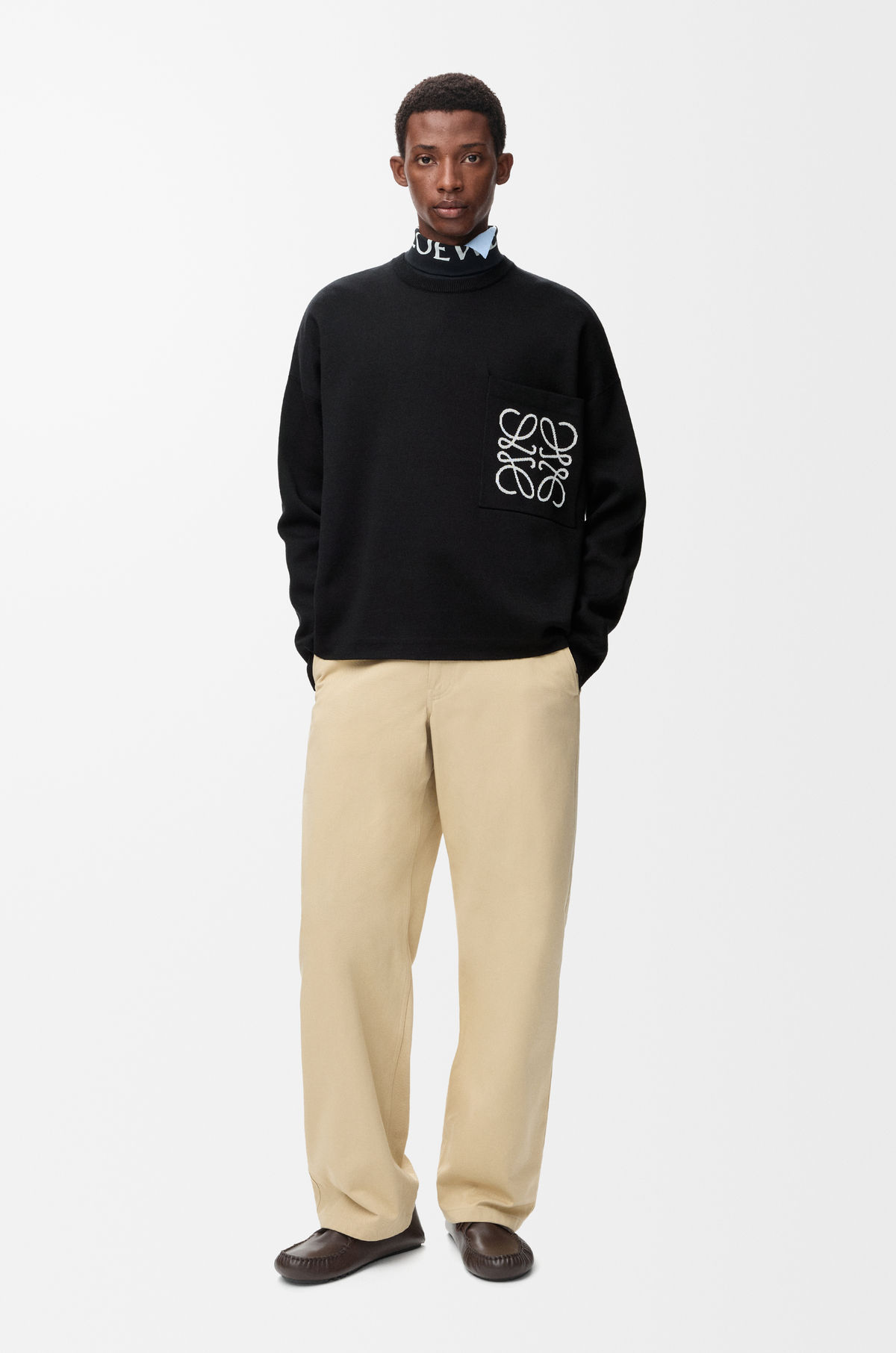 Sweater worn, showing relaxed fit and ribbed hem