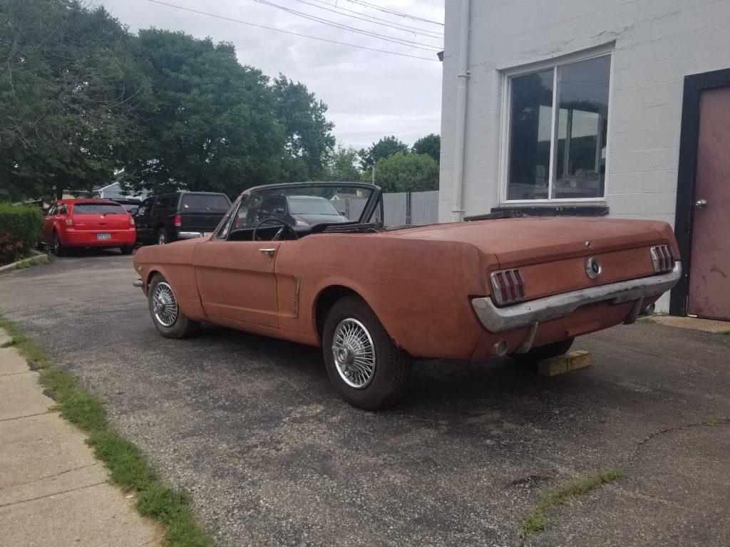 solid 1965 Ford Mustang Convertible