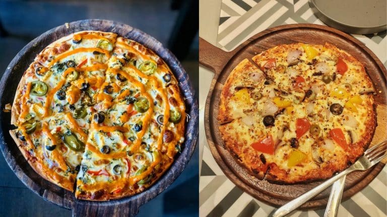 Two pizzas loaded with mayonnaise, cheese, and assorted veggies