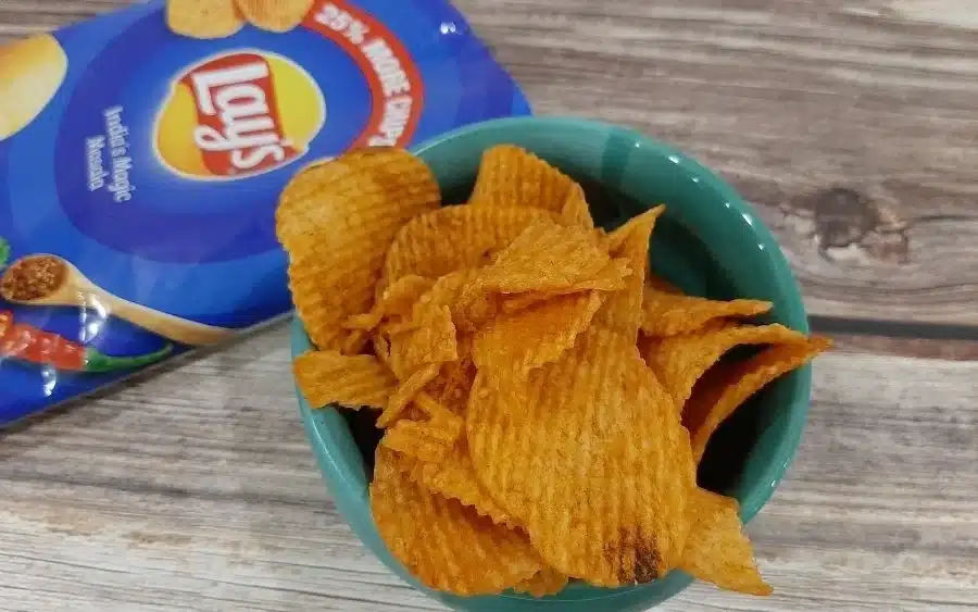 Late-Night Cravings? Try These 6 Irresistible Munching Delights 5 Packet of Lays and a bowl full of chips