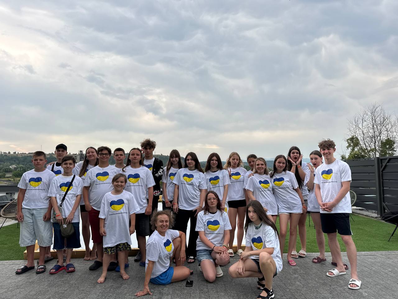 BHU first camp participants gathered outside in matching shirts