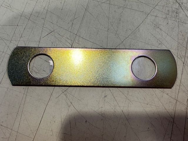 LOCK PLATE FOR SHACKLE SIDE