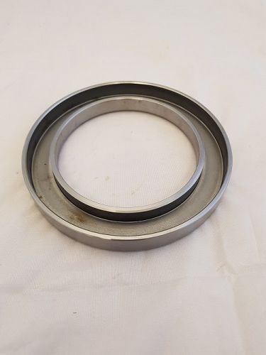 RETAINER, REAR HUB SEAL