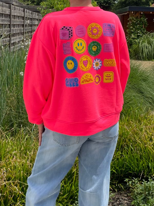 Sweater Smiley roze