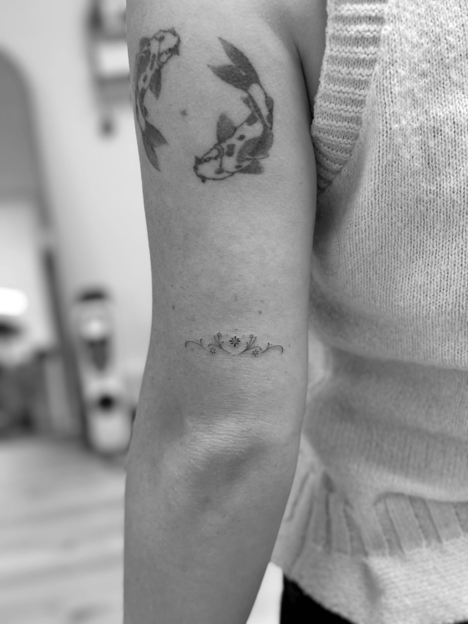 Fine line tattoo
