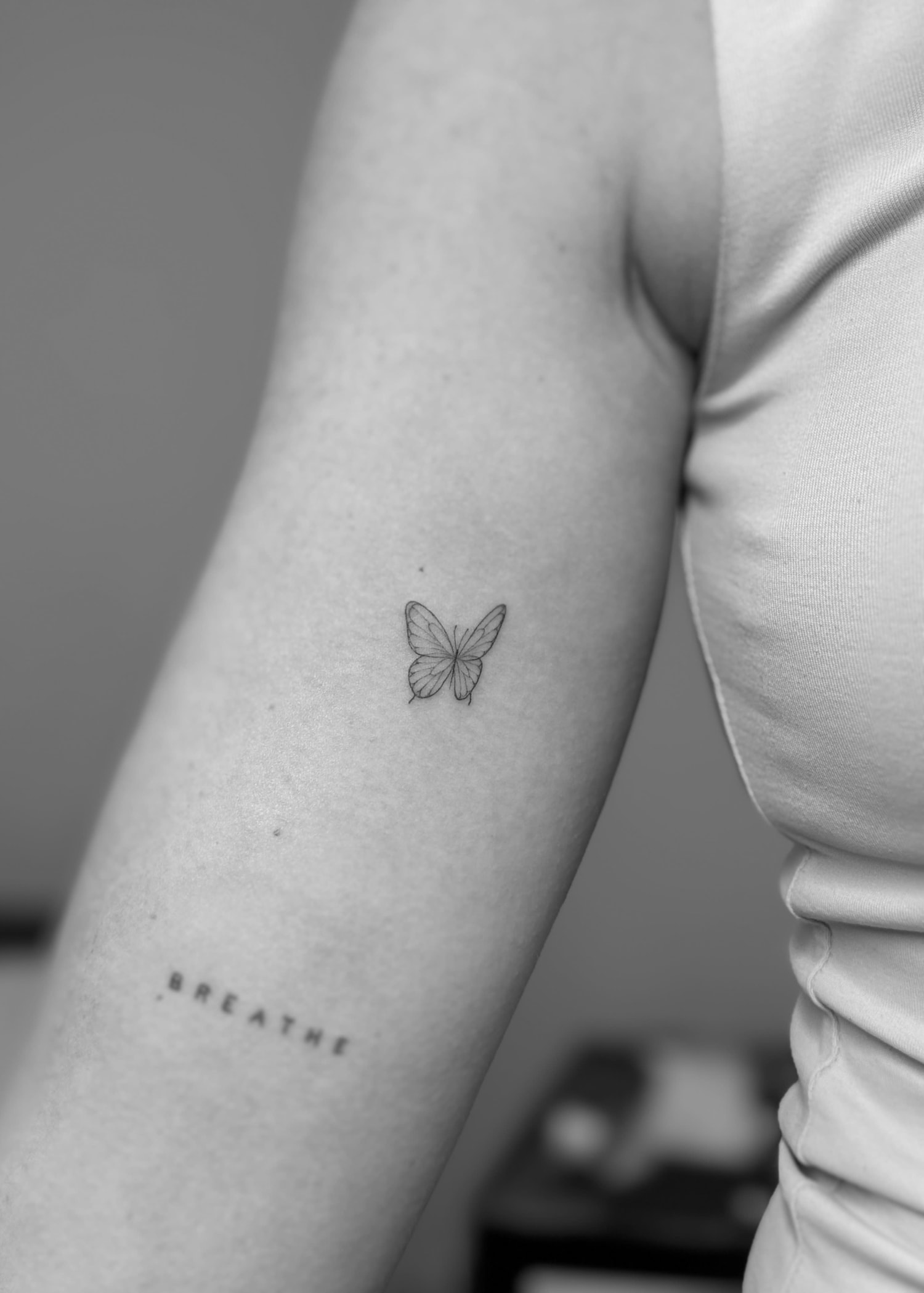 Fine line tattoo