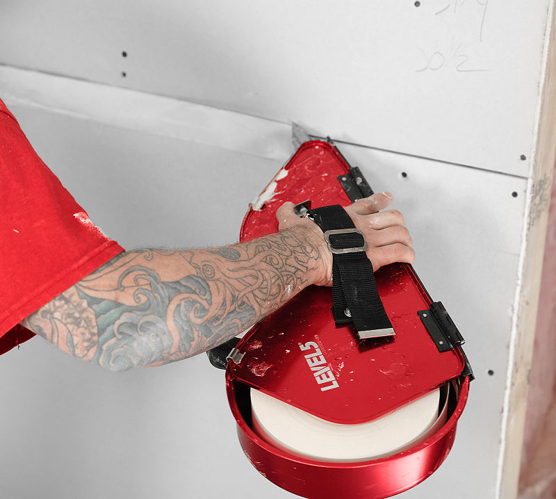Banjo taping a wall