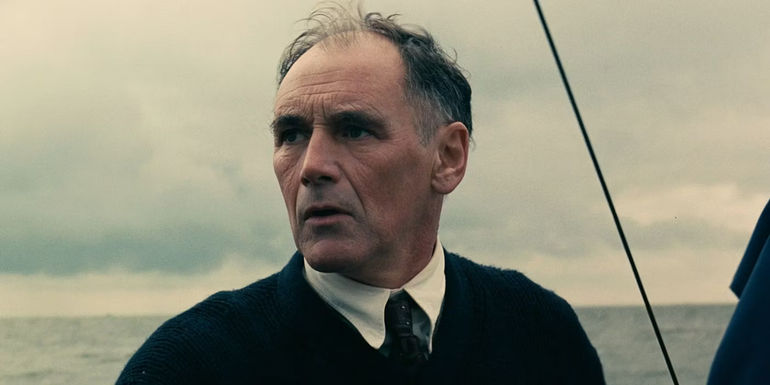 Mark Rylance looking out from his boat in Dunkirk
