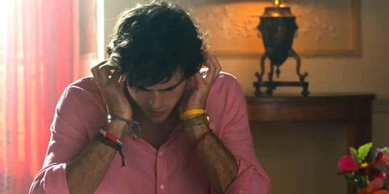 Felix covering his ears during the breakfast scene in Saltburn