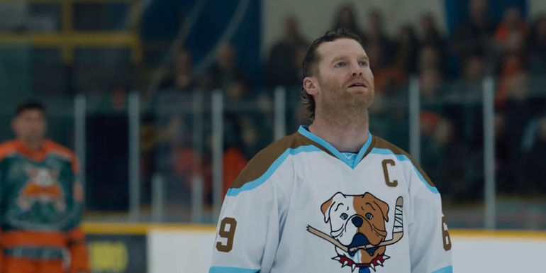 Shoresy standing on rink