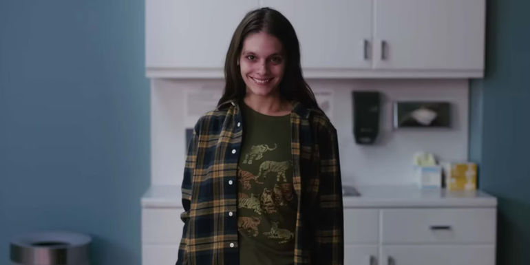 Laura smiling demonically in Smile