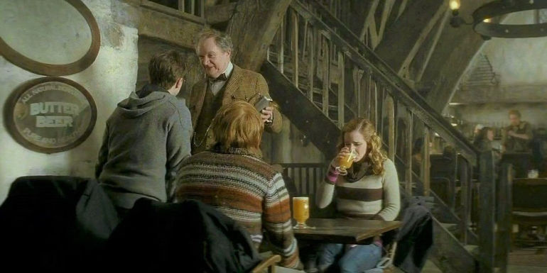 Harry, Ron, and Hermione running into Horace Slughorn in the Three Broomsticks in Harry Potter and the Half Blood Prince