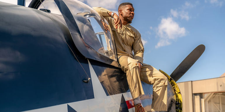 Jonathan Majors on Plane in Devotion
