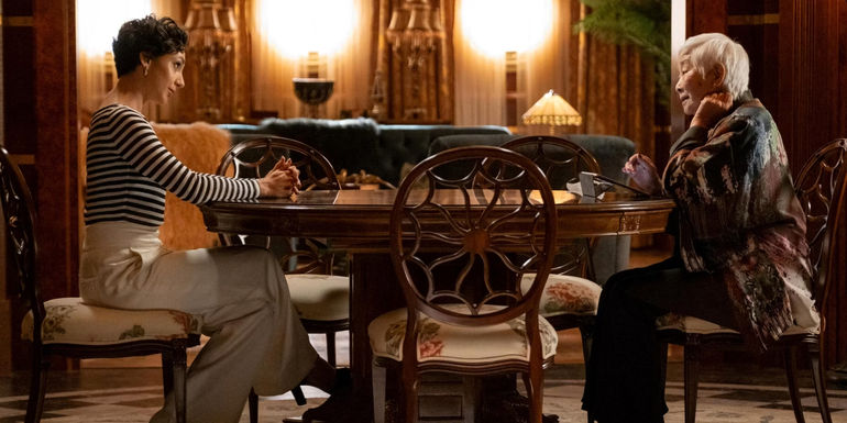 Anna & Celia Sitting Across From Each Other At A Table Talking In Death And Other Details.jpg