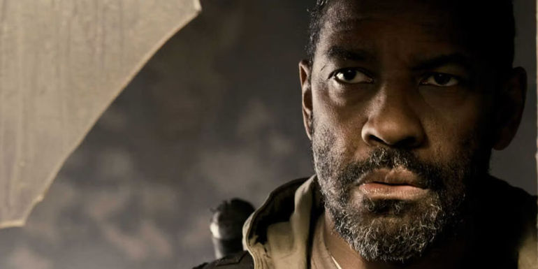 Denzel Washington as Eli observes an off-screen Solara in The Book of Eli.