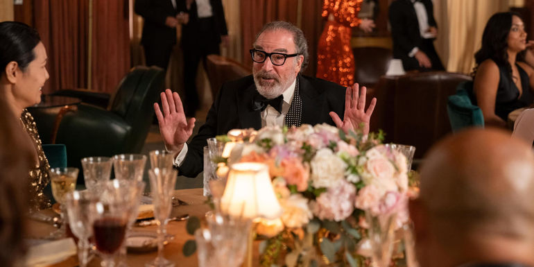 Mandy Patinkin as Rufus Cotesworth with his hands up in Death and Other Details season 1 episode 1