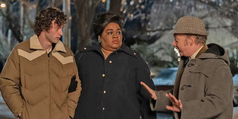 Mary (Davine Joy Randolph), Mr. Hunham (Paul Giamatti), and Angus (Dominic Sessa) outside in the cold in The Holdovers