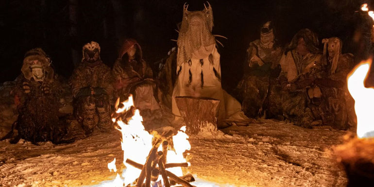 The cannibals sit around a campfire in Yellowjackets