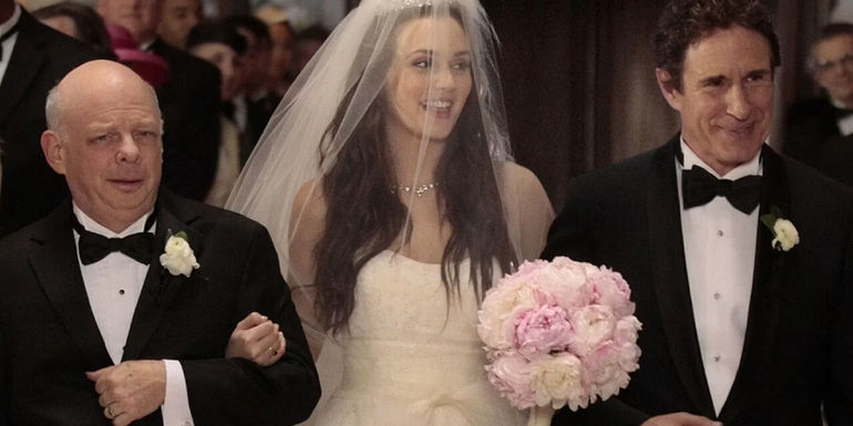 Blair with her father and stepfather at her wedding