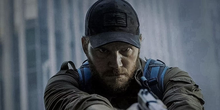 Chris Pratt as James Reece aiming a gun in The Terminal List